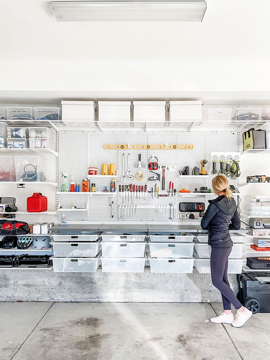 woman by tools in garage