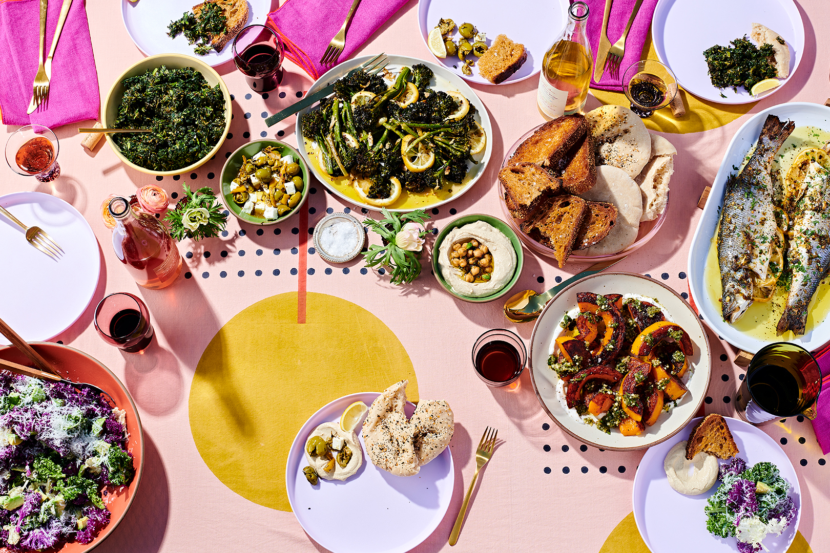 party tablescape with bright pink tablecloth