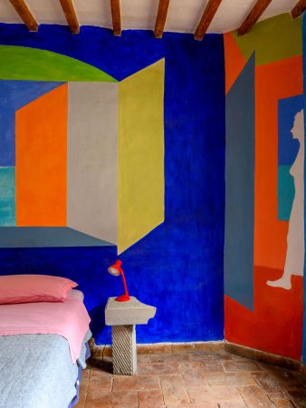 bright wall mural in bedroom