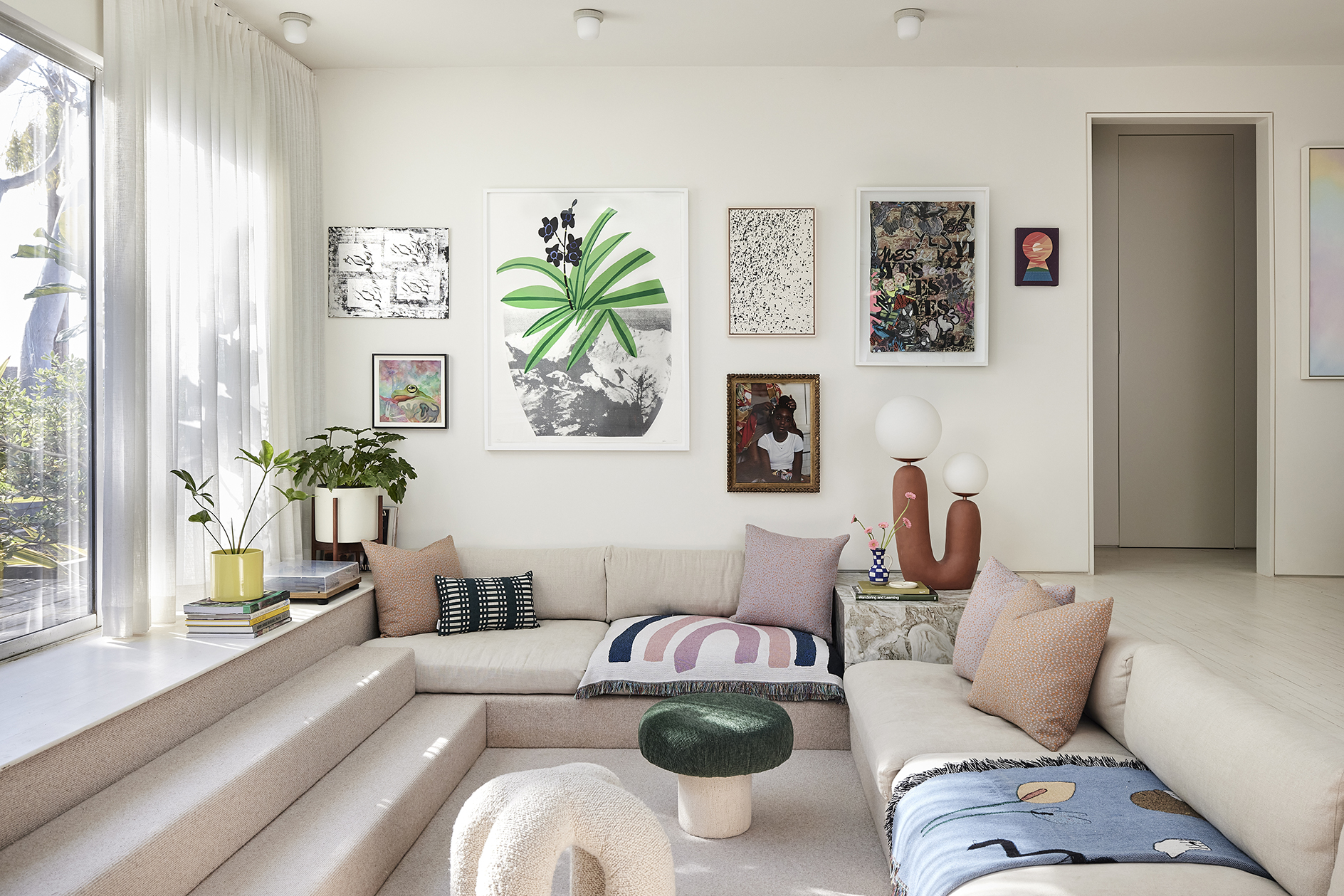 Sunken living room with stools in the middle