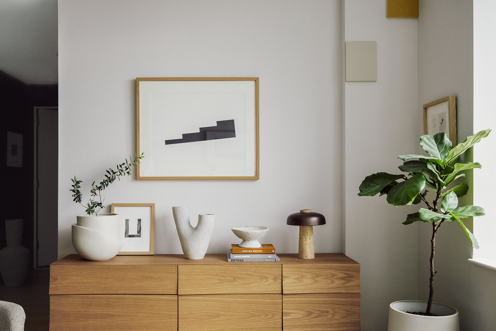 art hanging over credenza