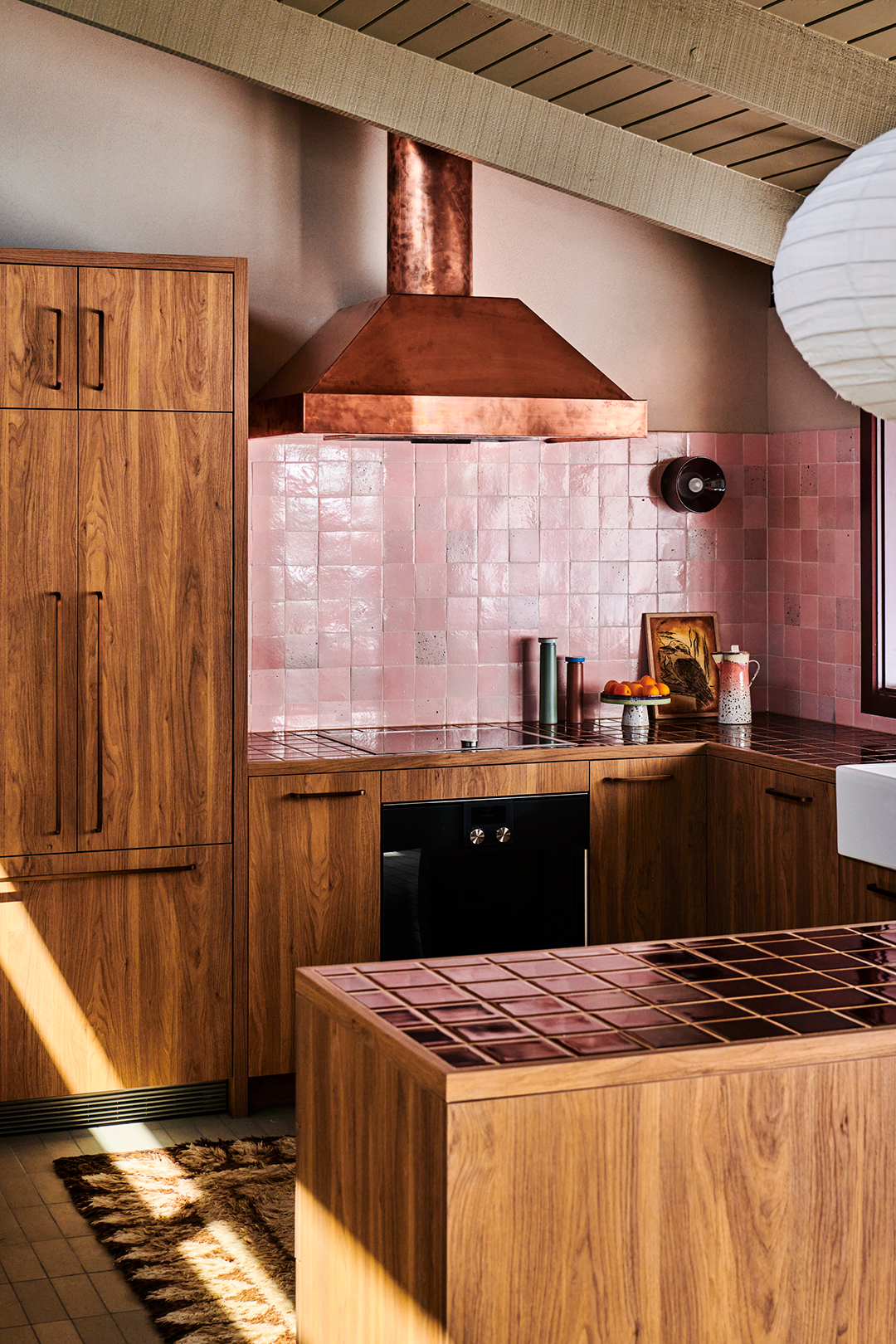 pink tiled kitchen