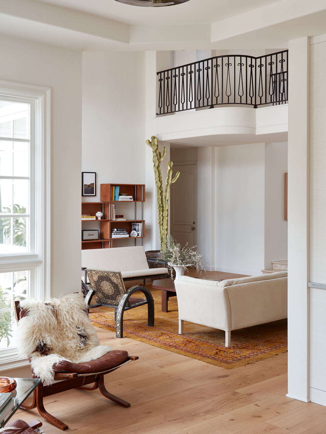 stair balcony overlooking living room