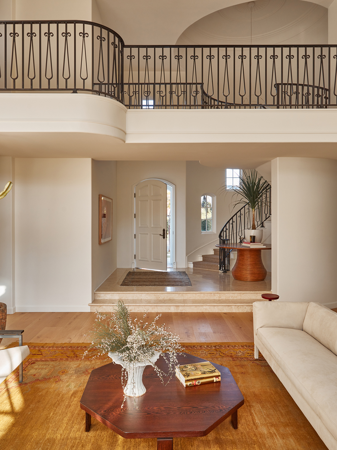 stair balcony overlooking living room