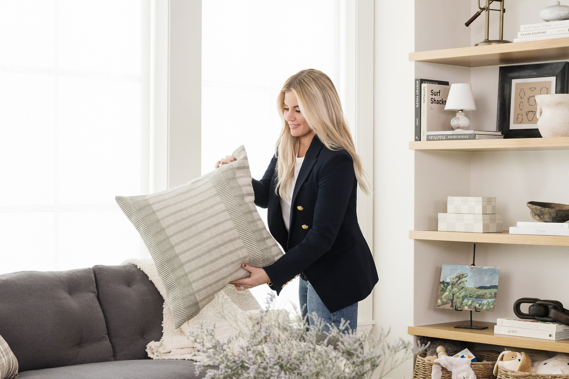 woman holding pillow