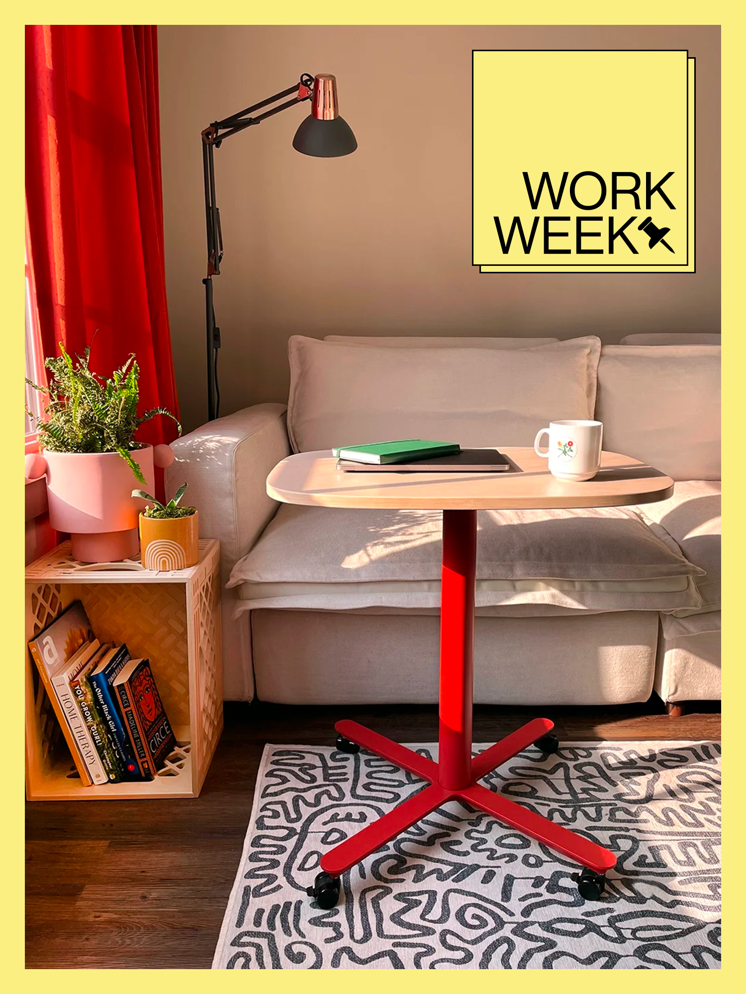 Red Herman Miller Passport Desk inside living room.