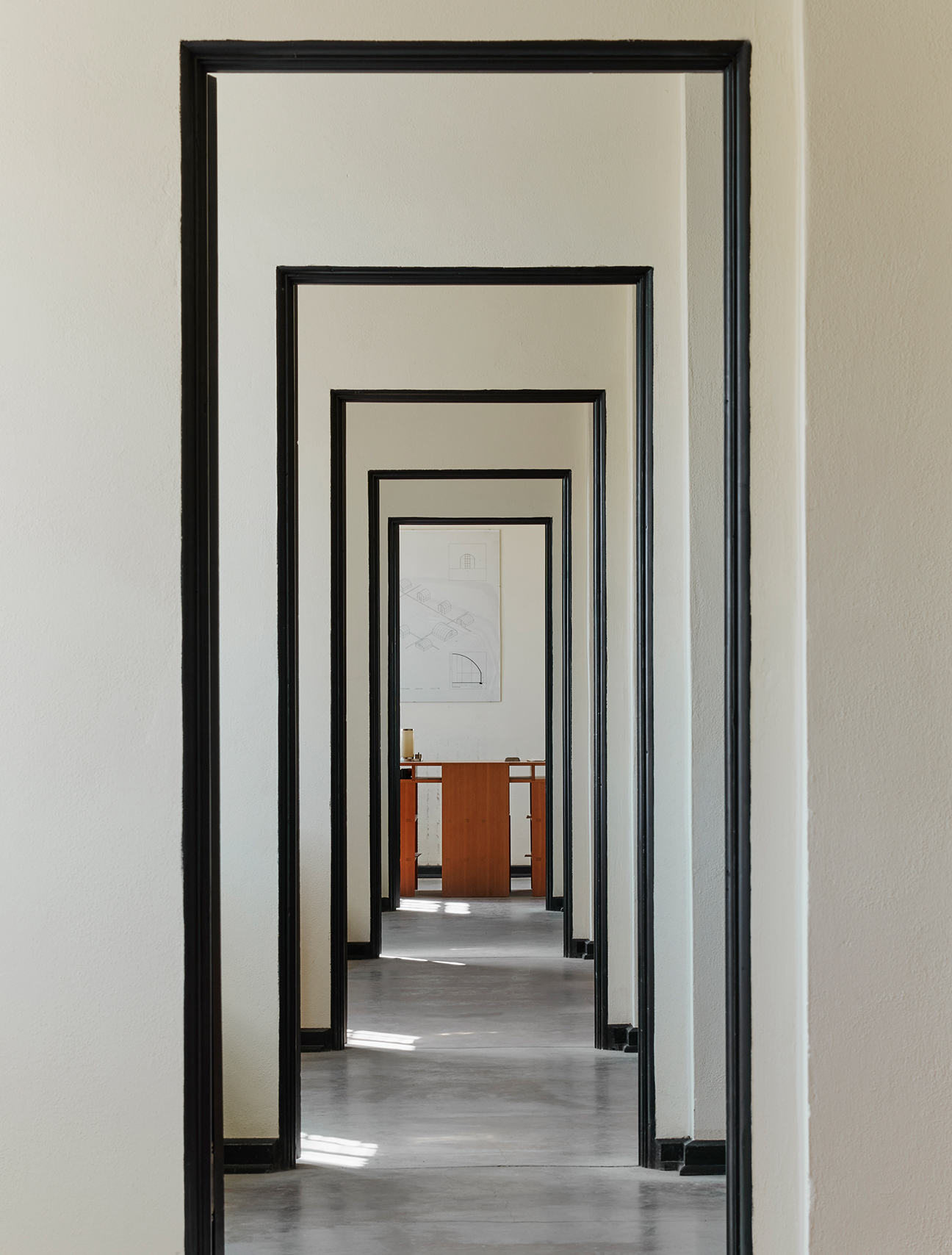 hallways with black-trimmed openings