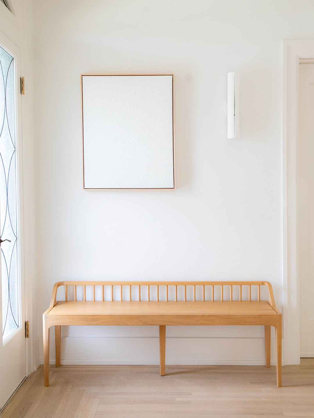 Wooden bench at doorway