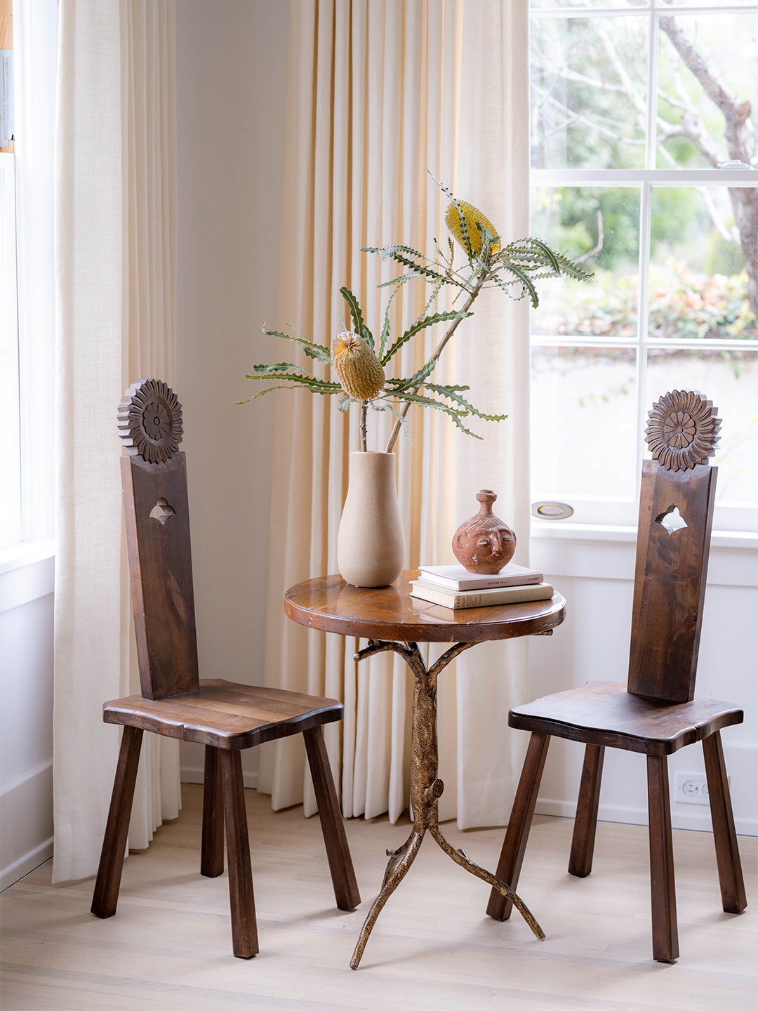 Wooden table and chairs in a corner