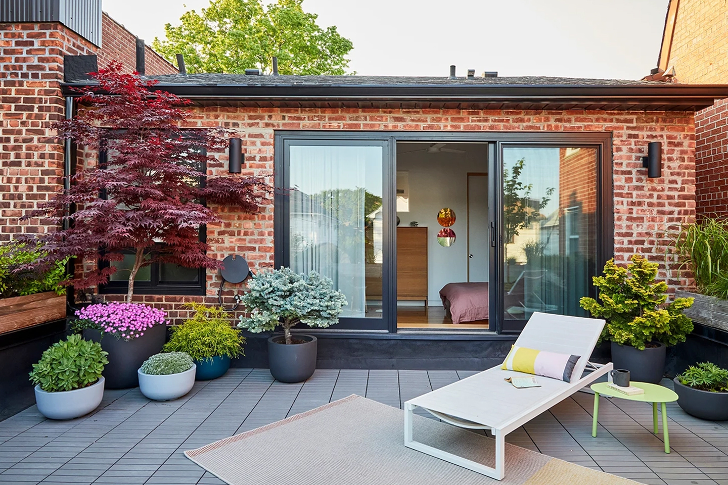 Outdoor rooftop terrace with chaise