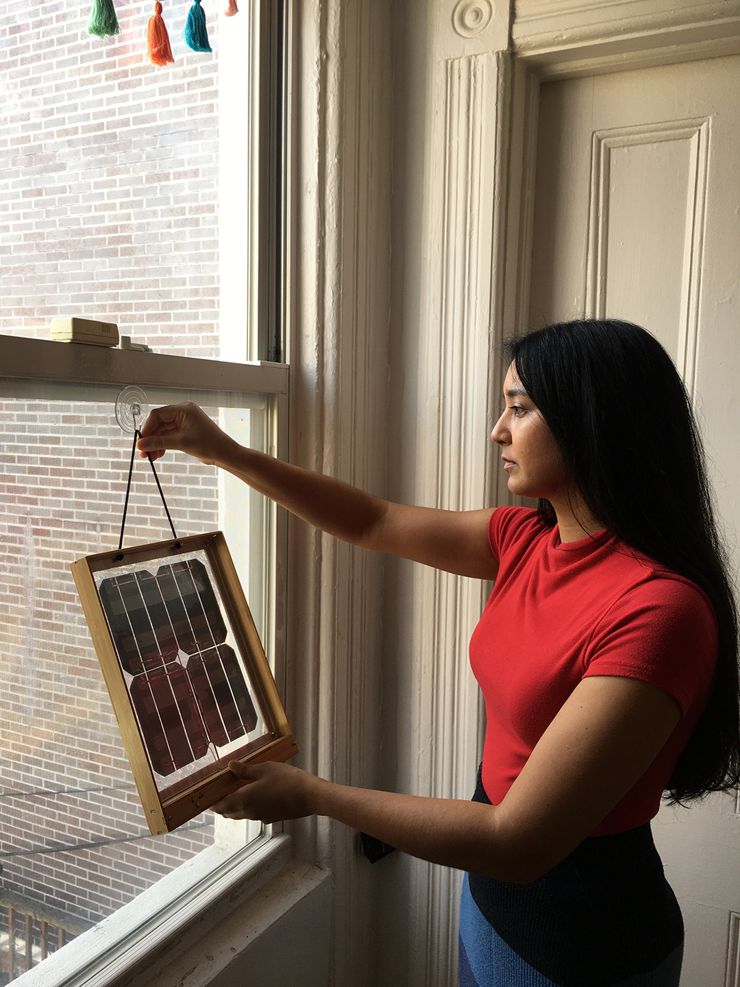 woman hanging panel