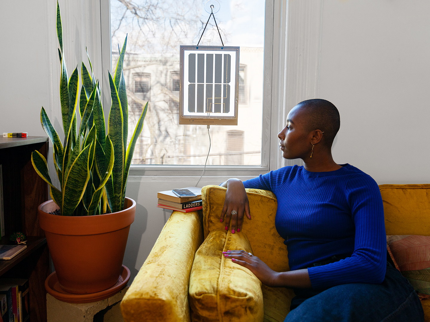 woman looking out window