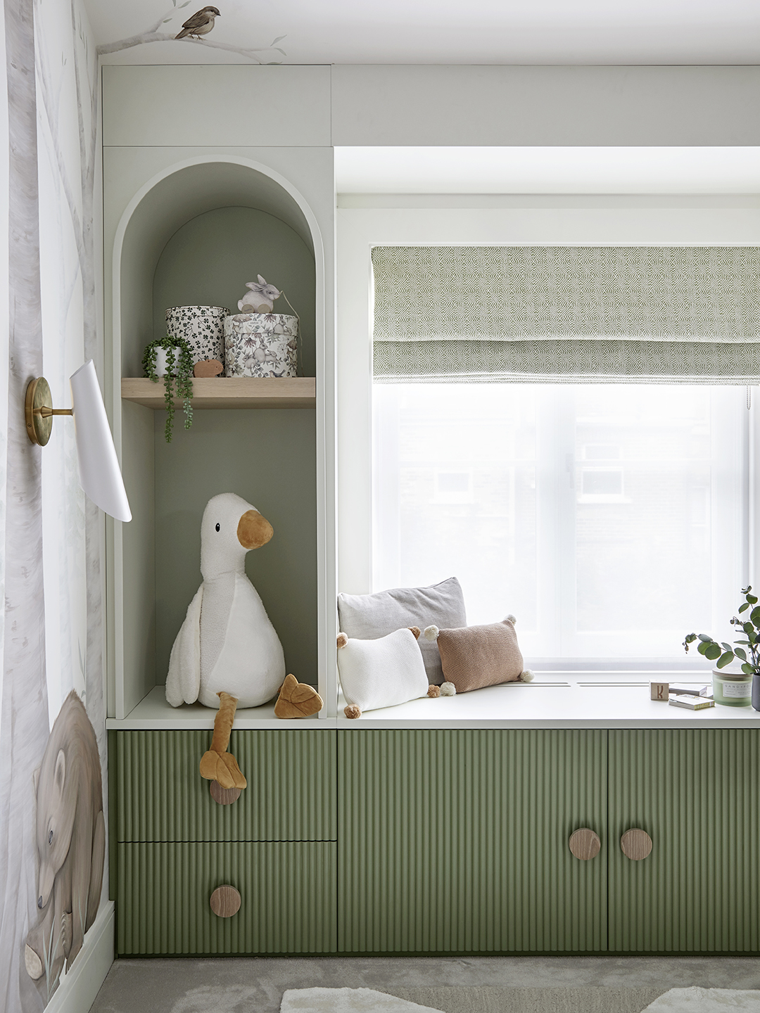 sage green built-in nursery storage