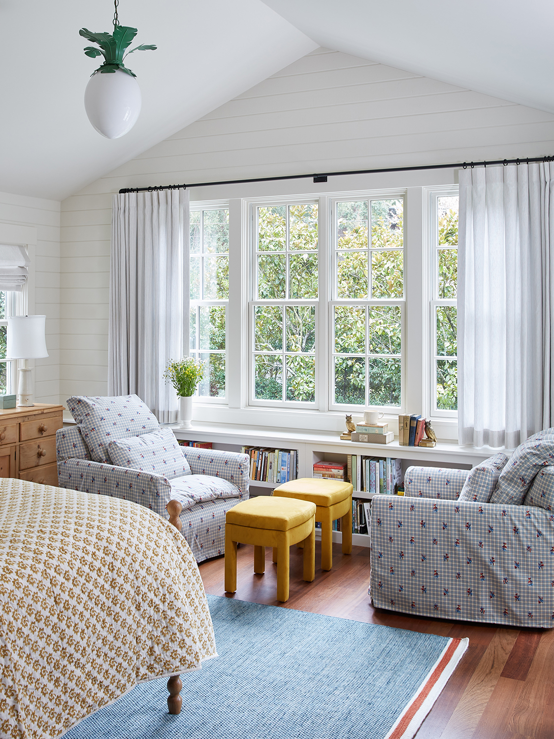 Bedroom with two loungers facing each other