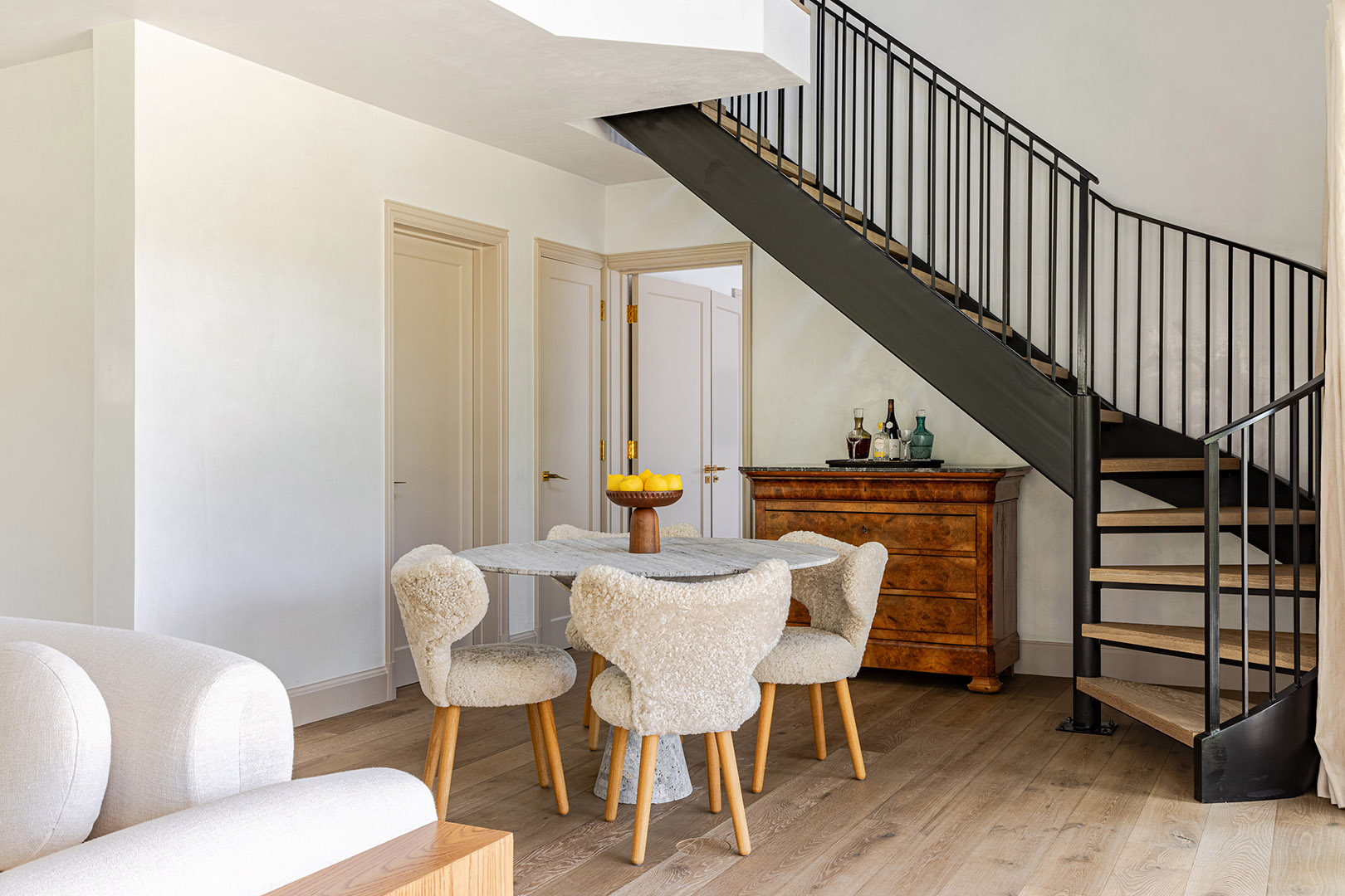 shearling chairs around dining table