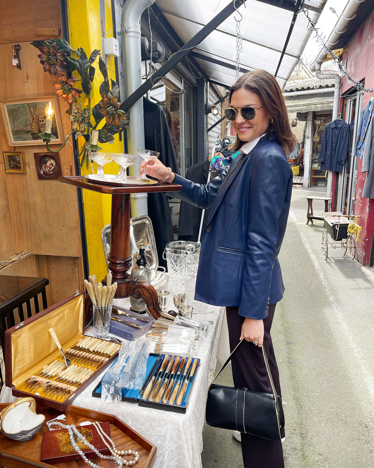 Woman shopping a French flea market