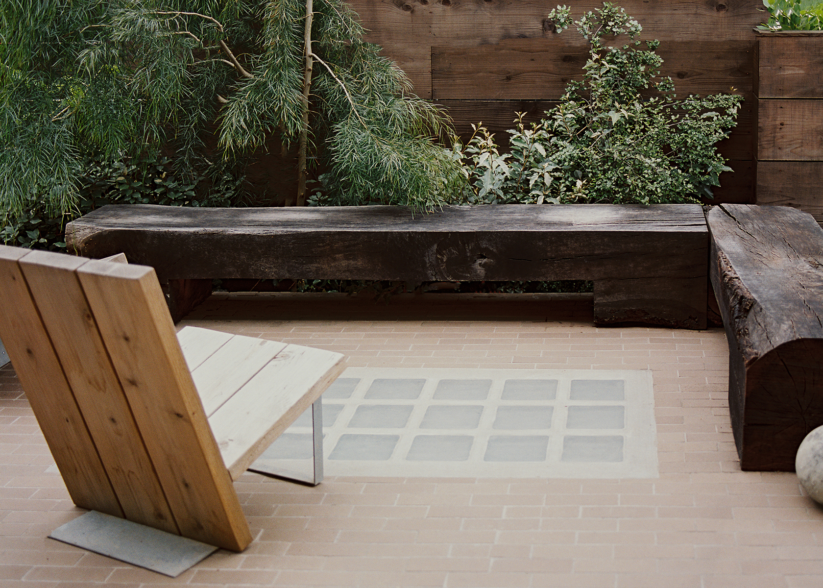 chair next to glass blocks