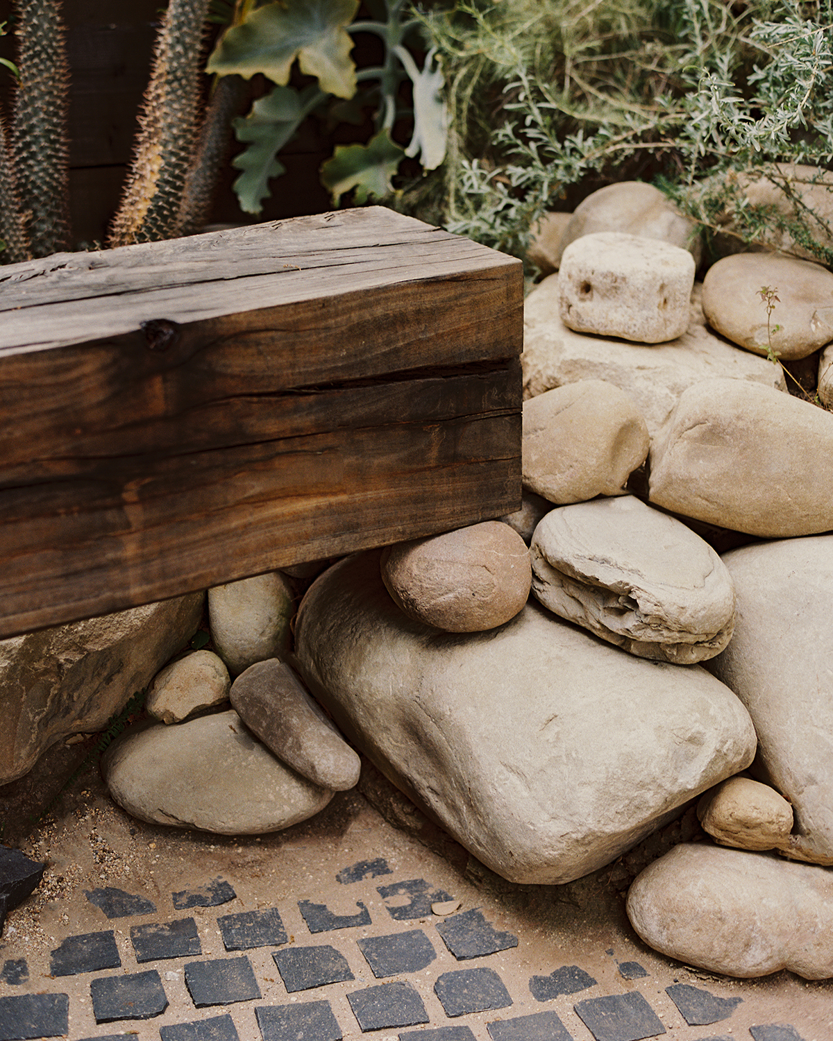 wood beam on rocks