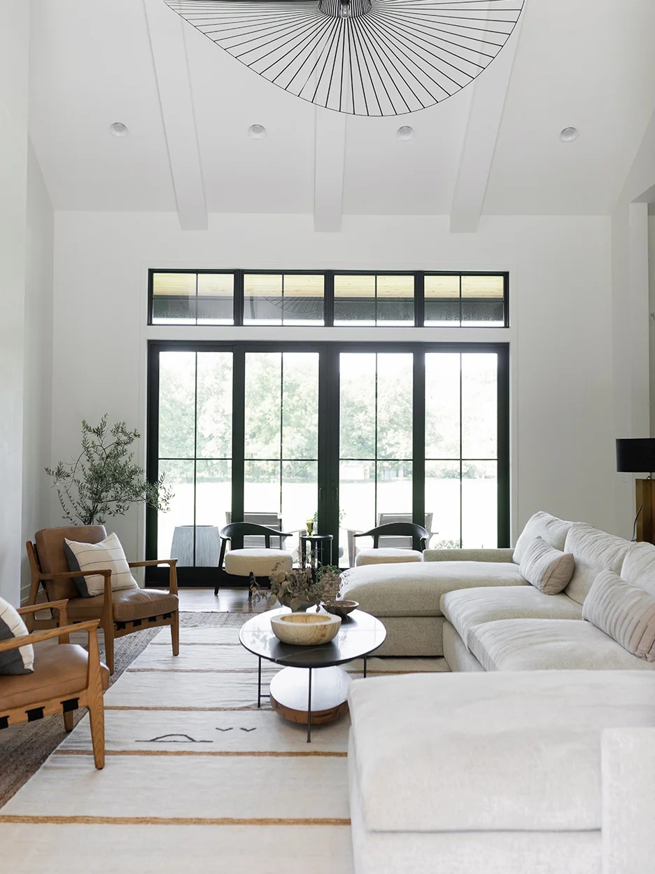 cream sofa and black pendant light