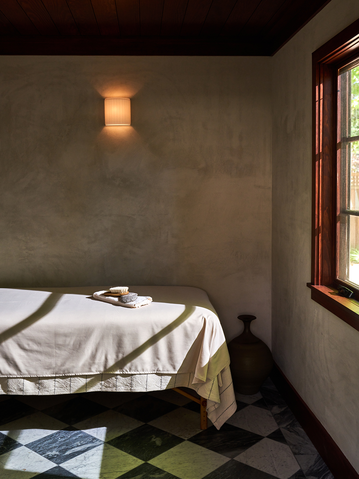 Spa treatment room with gray walls