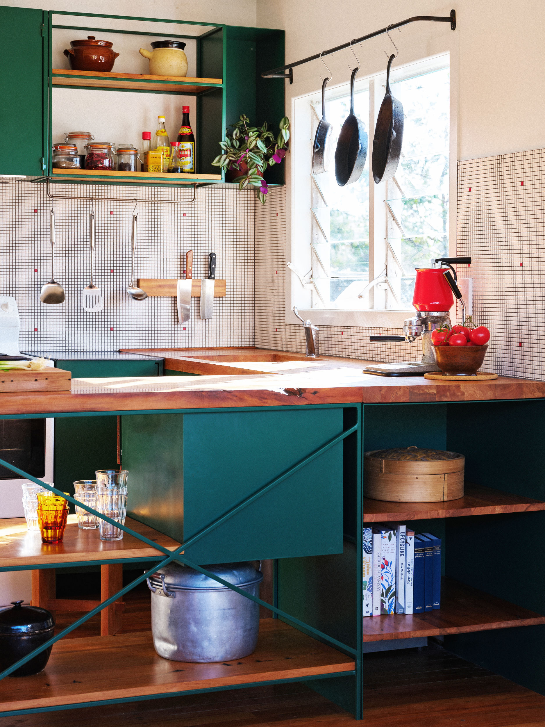 green kitchen with wood counters