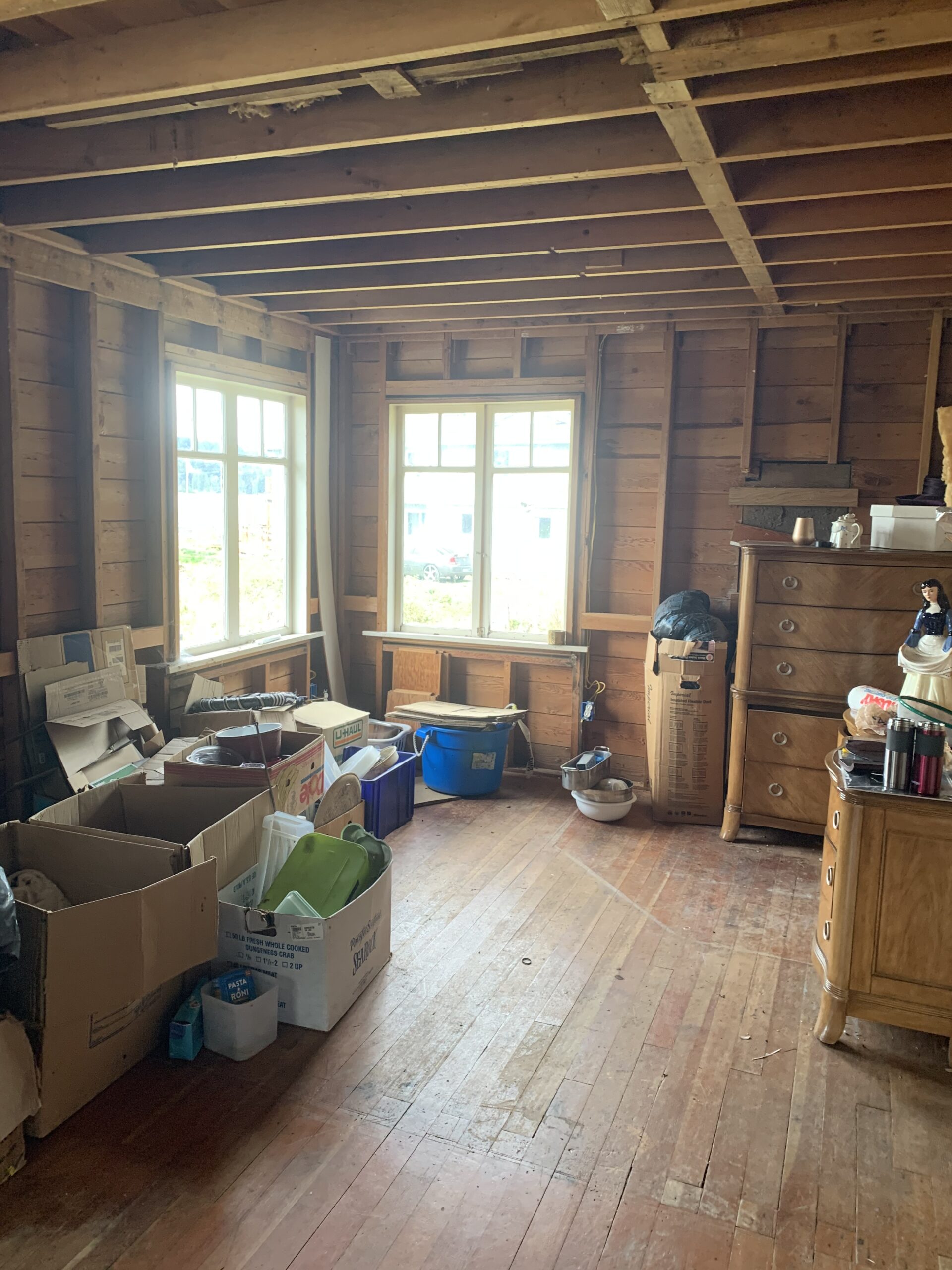 cluttered wood living room