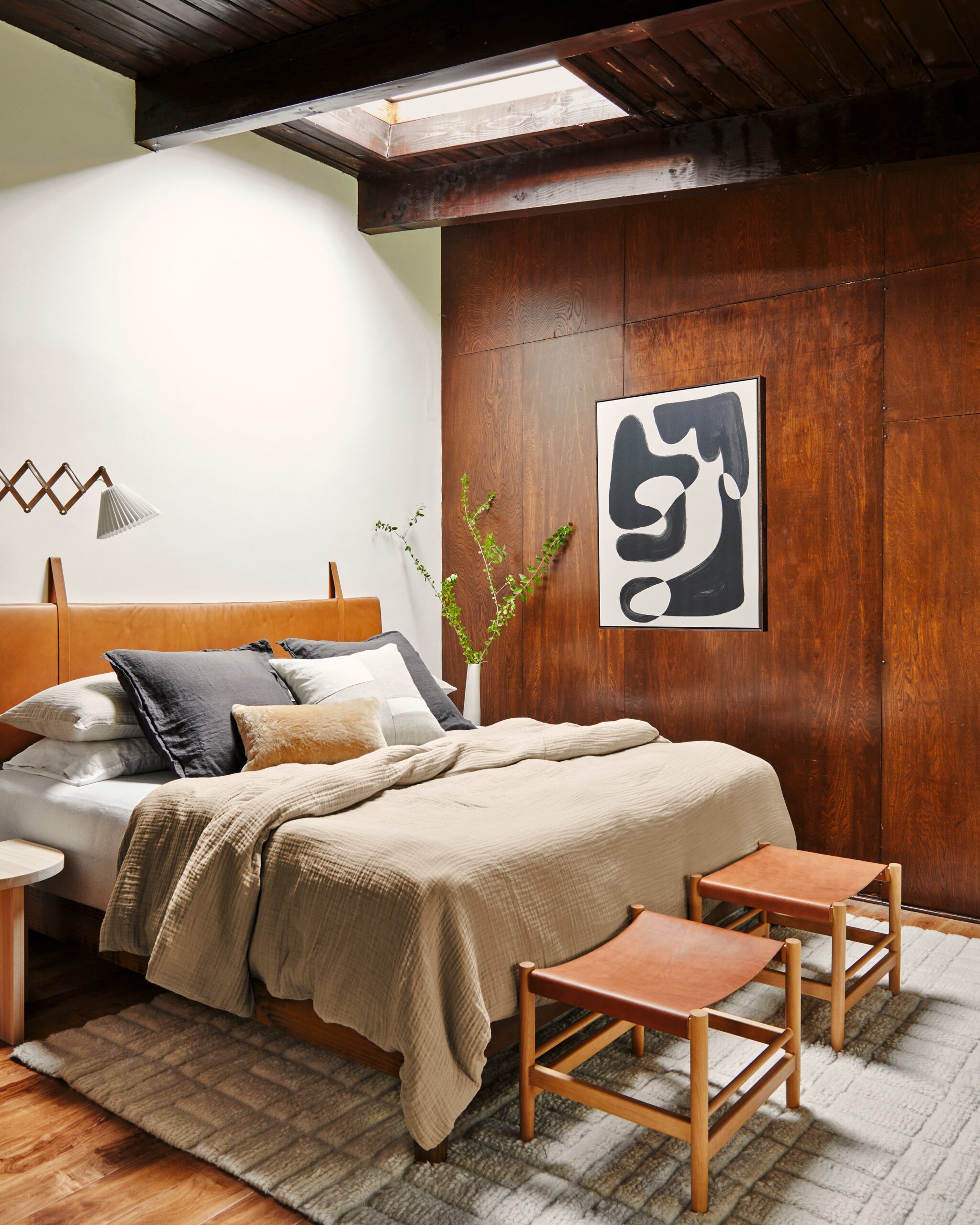 wood paneled bedroom