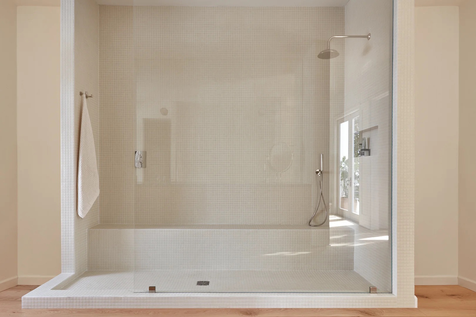 white mosaic tile shower