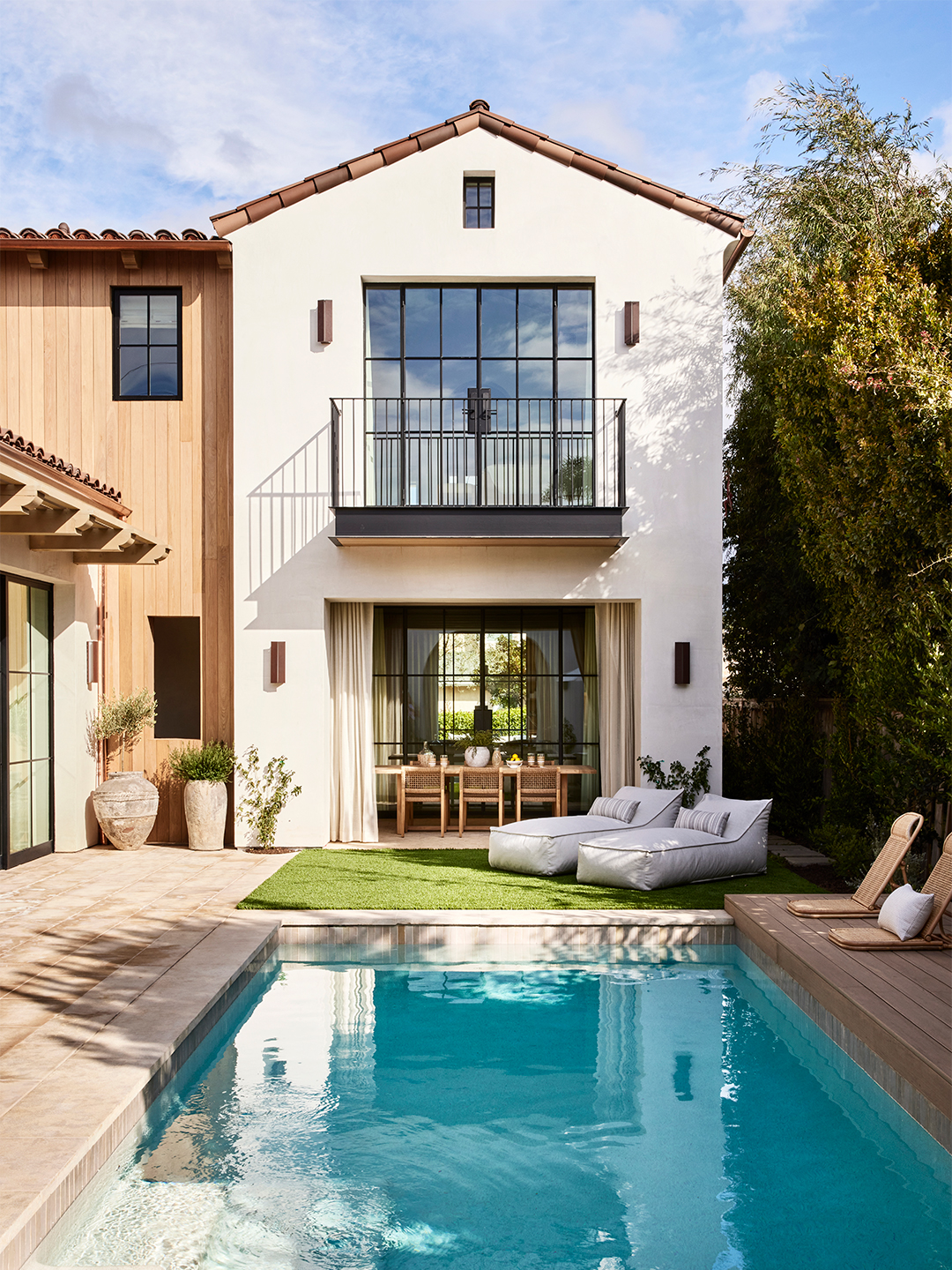 View of the pool looking into the side living room