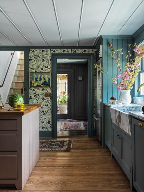 How These Designers Prevented Their Dark Blue Kitchen from Feeling Too Cold