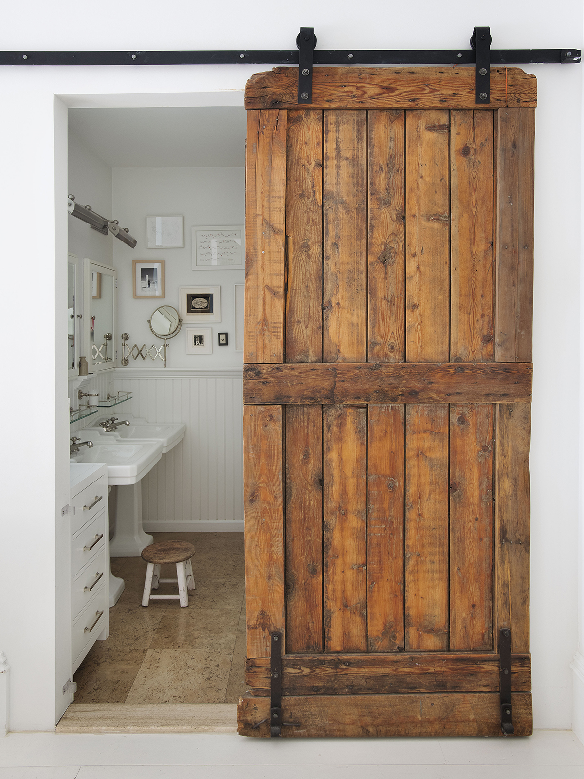 Bathroom with wooden barn door