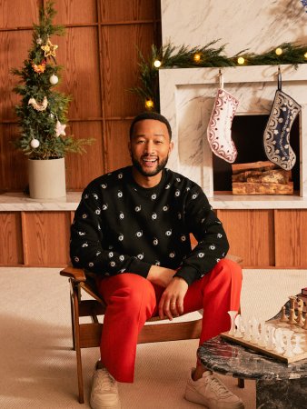 man in sweater on chair