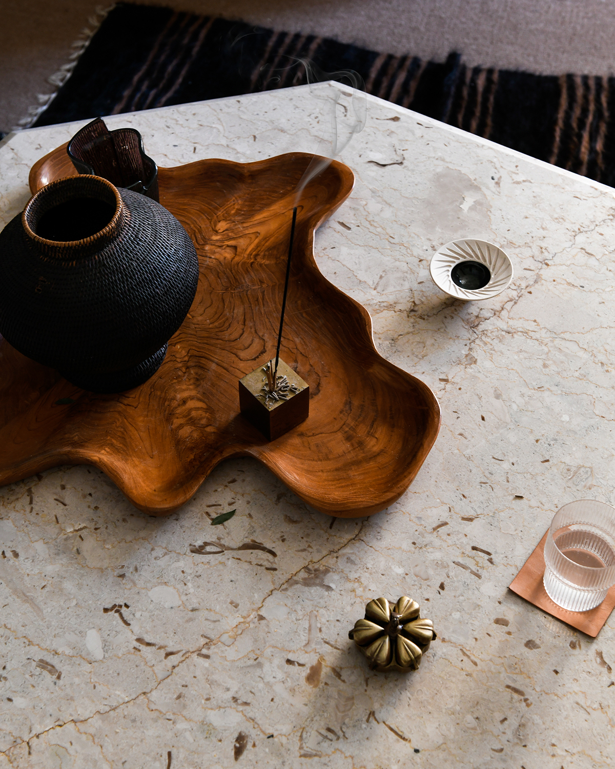 Travertine table with wooden tray