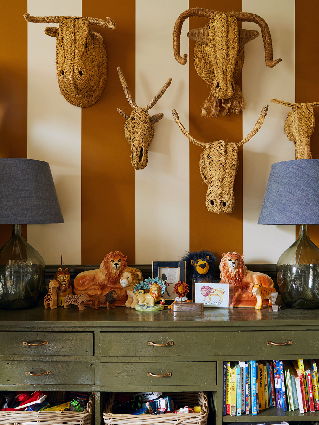 kids dresser with animals on the wall