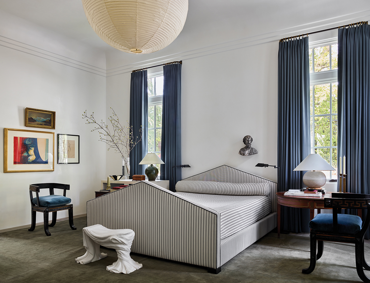 blue and white striped upholstered bed