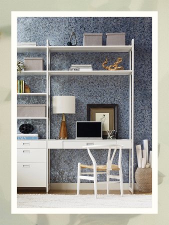 white metal and wood desk with storage boxes on open shelves