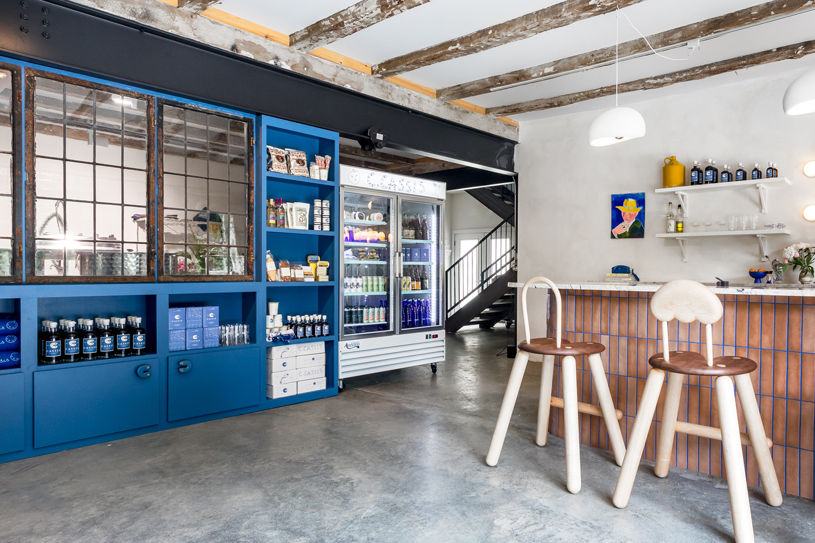 Tasting room shelves painted blue