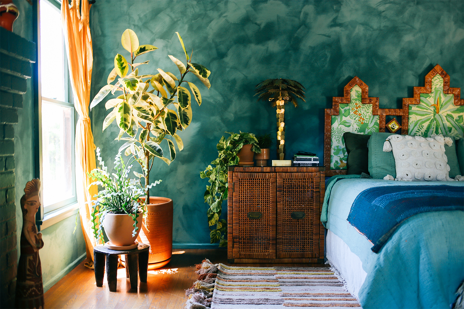 Bedroom with teal walls