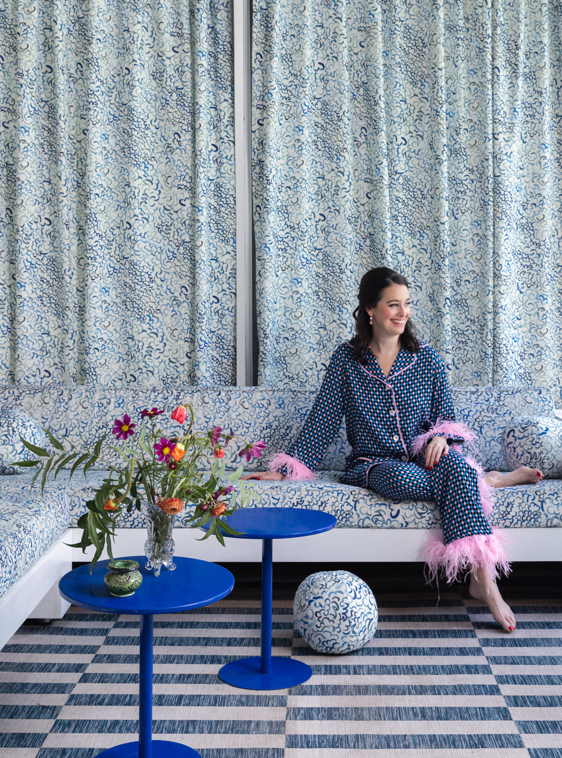 woman in PJs on couch