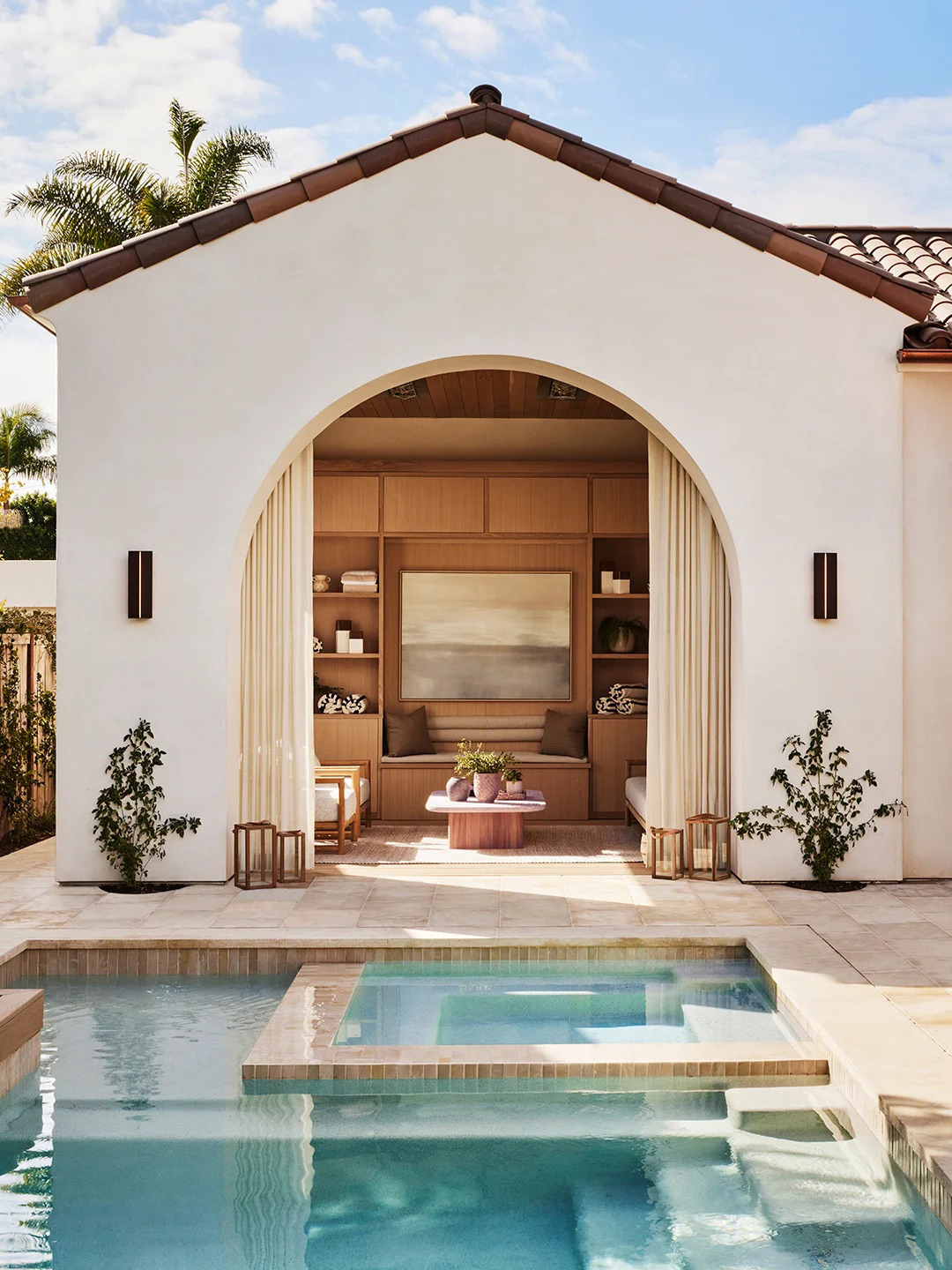 outdoor living room next to pool