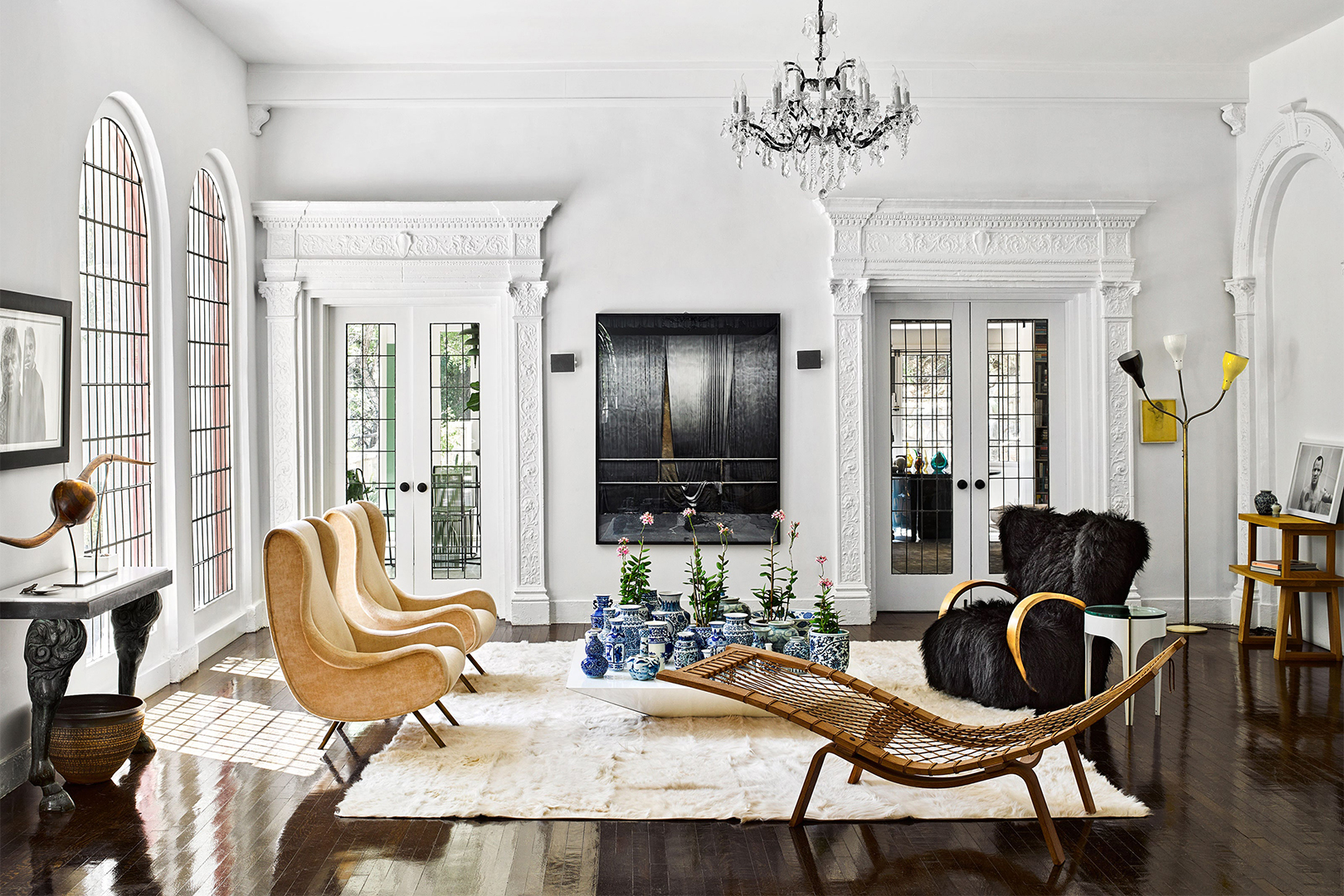 White living room with tan chairs