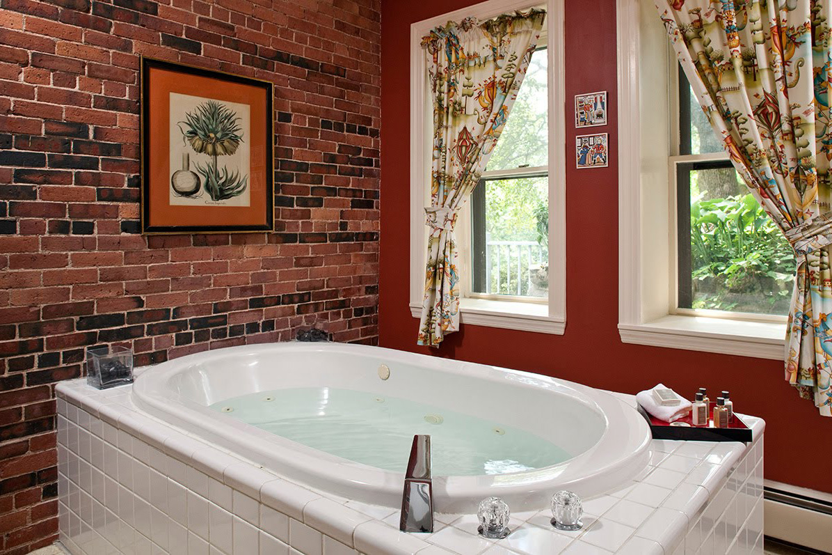 tub next to brick wall