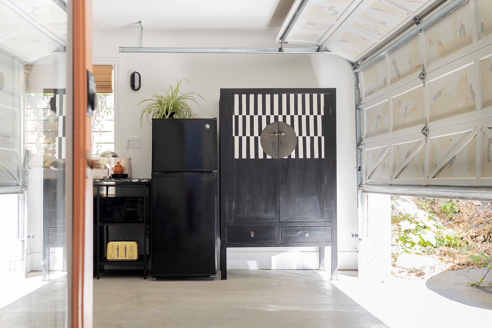 cabinet and kitchen near garage door