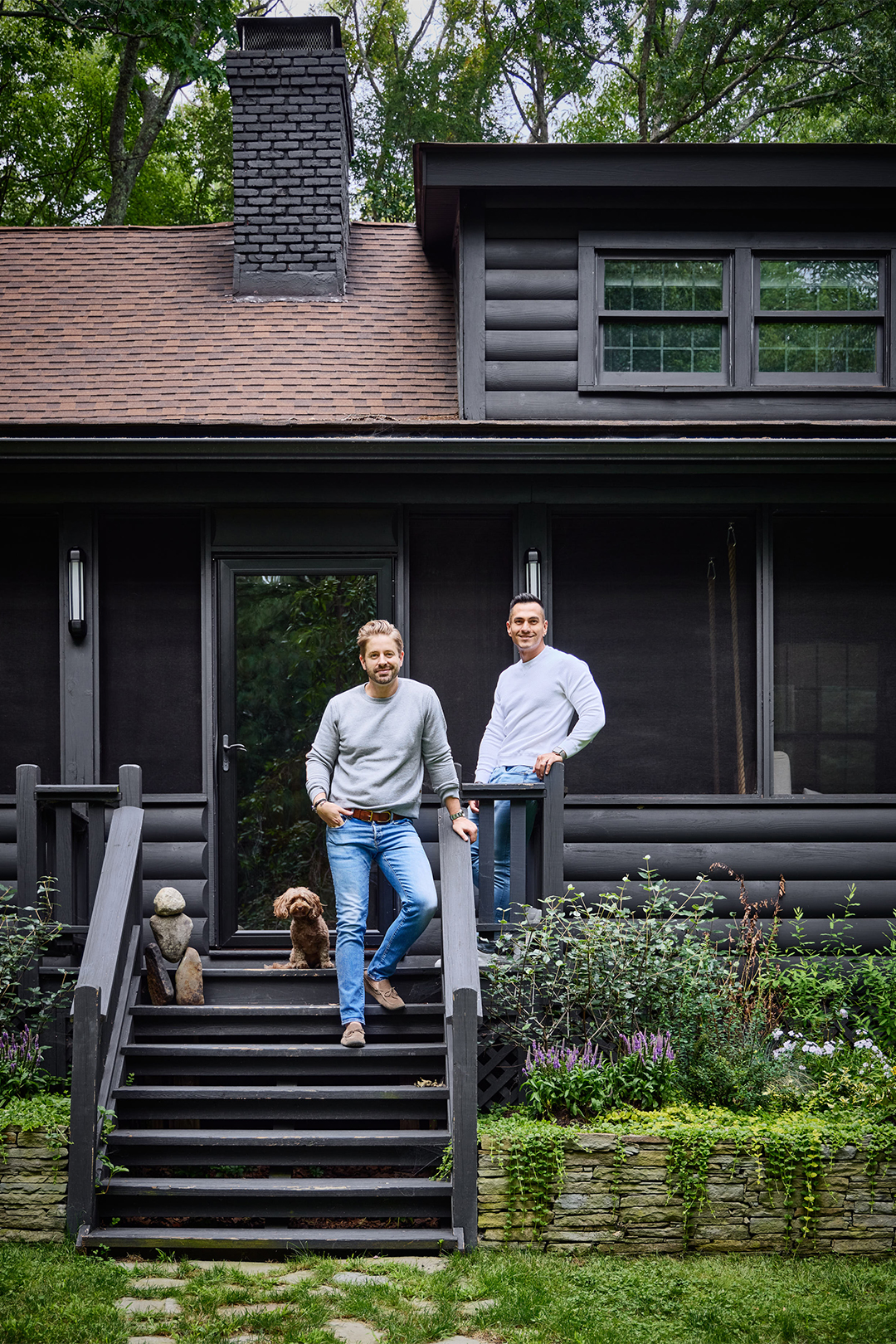 couple standing on porch