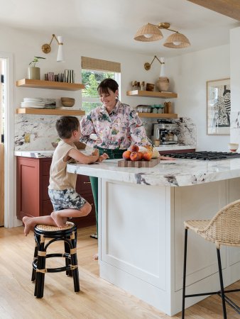 woman in kitchen with son