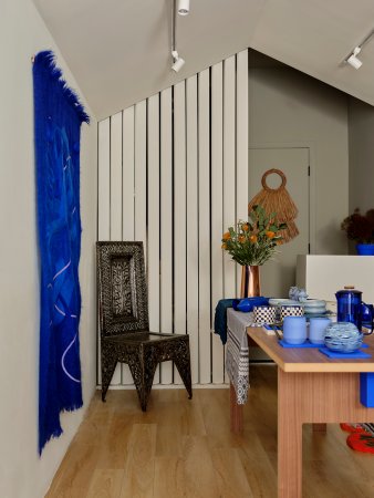 Store with cobalt blue wall hanging