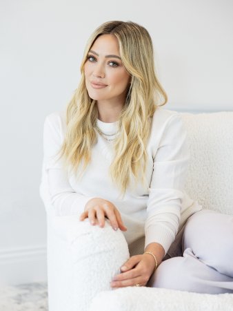 woman in white on white chair