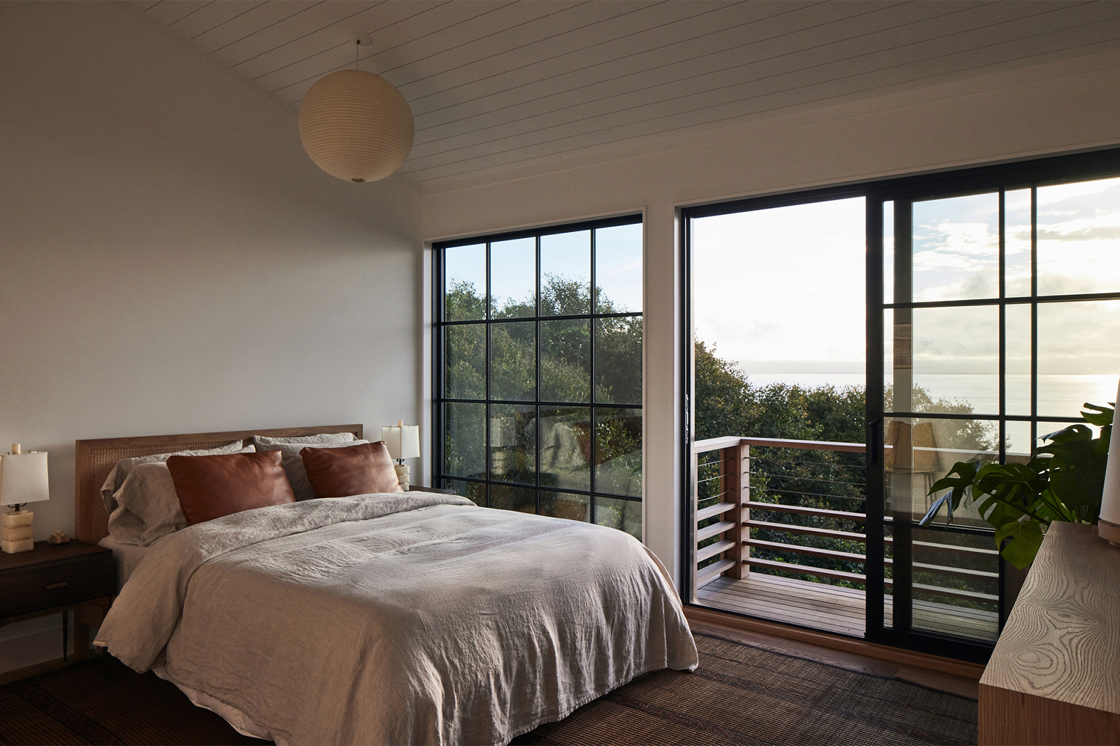 Bedroom with door open to balcony