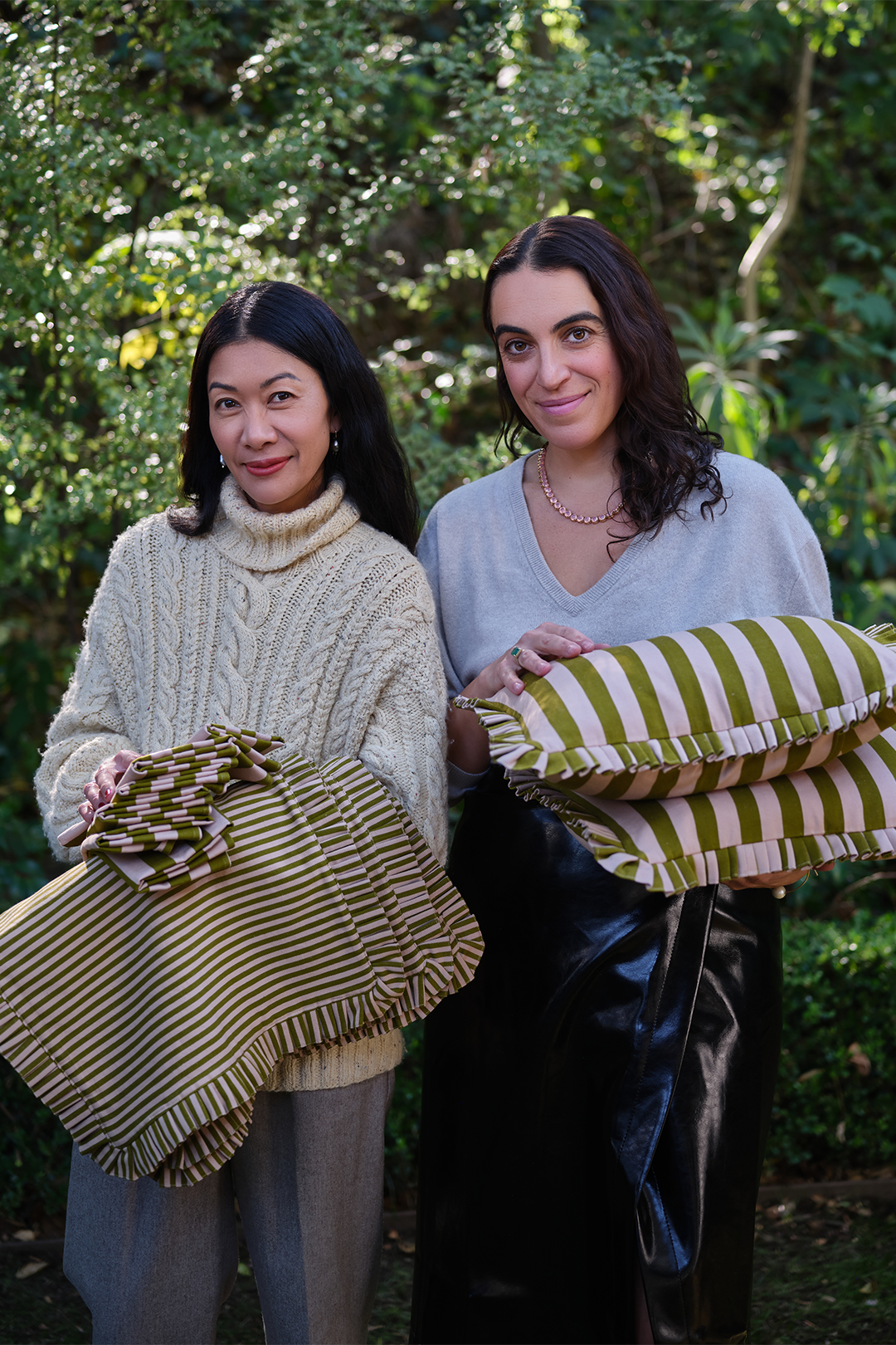 women holding pillows