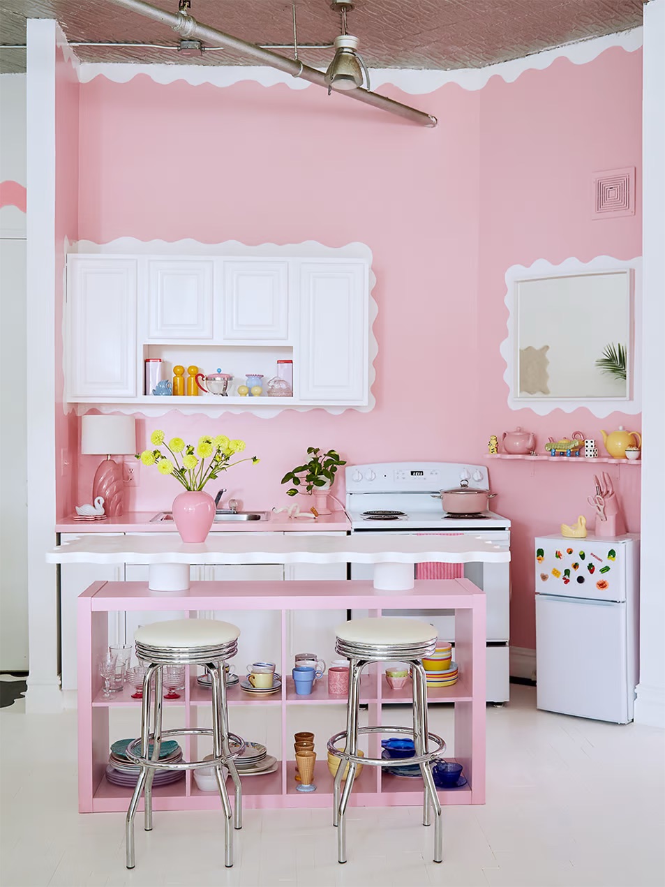 Pink kitchen with white squggles